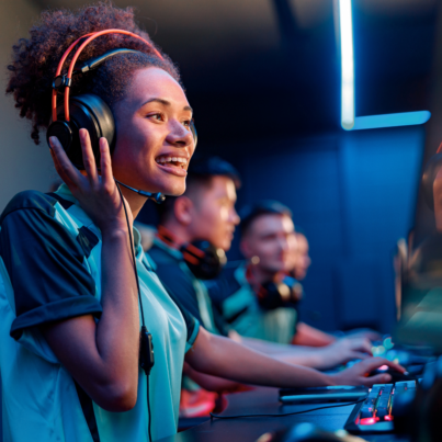 girl wearing headset playing esports